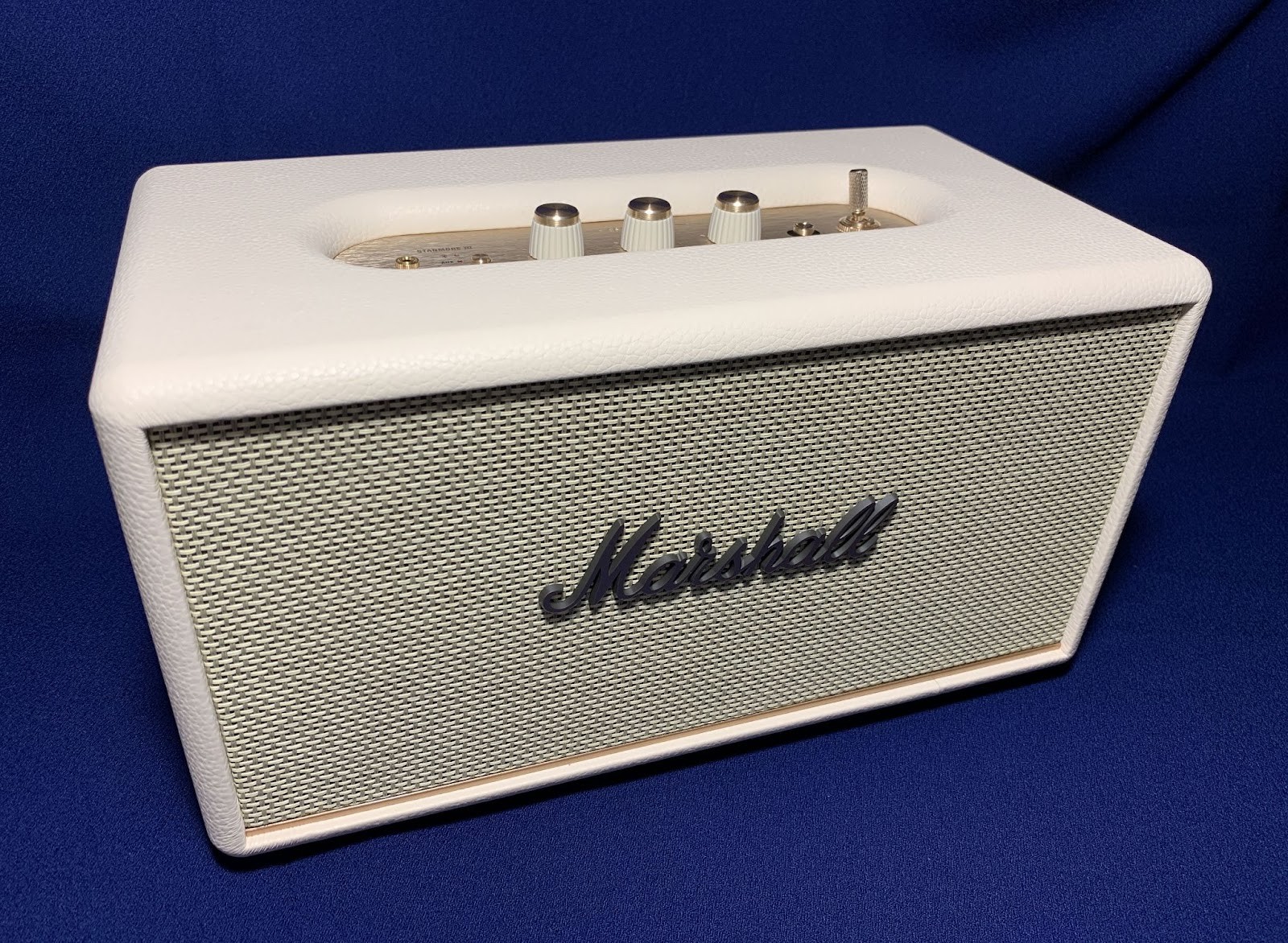 The design of the speaker is vintage and recognizable. 