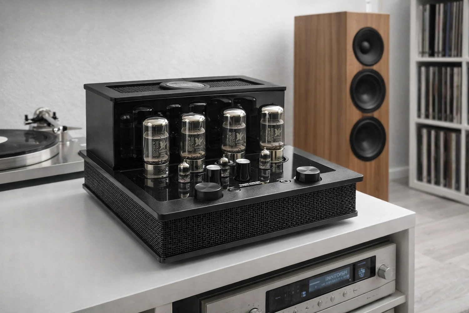 Audio Research introduces the I/70 integrated tube amplifier with four 6550 tubes, automatic bias control, 2×70 watts of power, optional DAC and MM/MC phono modules, balanced inputs, and headphone output. Priced from $12,000.